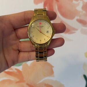 Kate Spade Gold-Tone Watch with pink Accent
